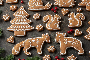 Homemade Christmas gingerbread cookies on a dark background