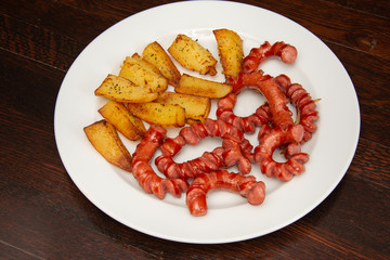 sliced sausages with  nature potatoes