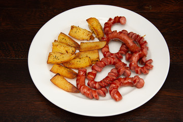 sliced sausages with  nature potatoes