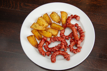 sliced sausages with  nature potatoes
