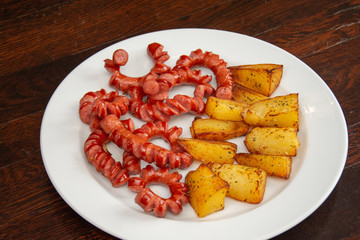 sliced sausages with  nature potatoes