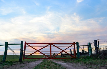 Fototapeta na wymiar Field gateway in countryside, Patagonia , Argentina