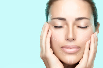 Beauty Face Spa Woman. Surgery and Anti Aging Concept.. Blue background