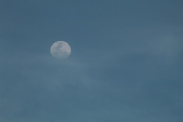  the moon in a late afternoon