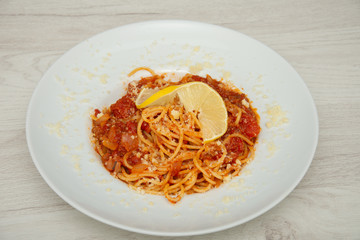 platter with Spaghetti Tono  ,Spaghetti Tonno - pasta, tuna, tomatoes, garlic,