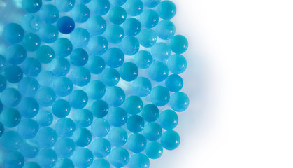 One is different. Together we are strong. Lots of spheres coming together in an abstract pattern.