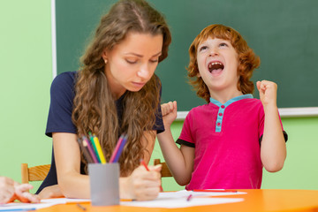 Little children studying in elementary school