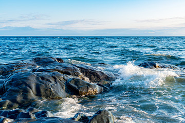 waves crashing on rocks