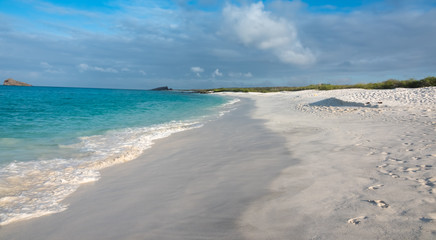 Deserted beaches with white sands and clear waters on Espanola Island, Galapagos Islands, Ecuador