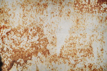 Painted wall texture with cracks and rust