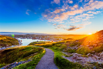Fototapeta na wymiar View of St John city from Signal Hill at Newfoundland, Canada with sunset sky as background during summer