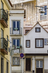 Fototapeta premium Charming houses and weathered facades in Alfama, Lisbon, Portugal