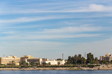 Naklejka premium Luxor, Egypt, Karnak Temple, complex of Amun-Re. View of the ancient city of Thebes from the Nile. Panoramic city, view from the river.