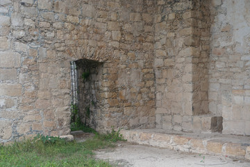 Fototapeta na wymiar Dzibilchaltun, Yucatan, Mexico: Interior of the ruins of a Spanish mission church built c. 1590-1600 from the stones of Mayan structures.