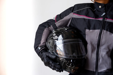 person taking a motorcycle helmet