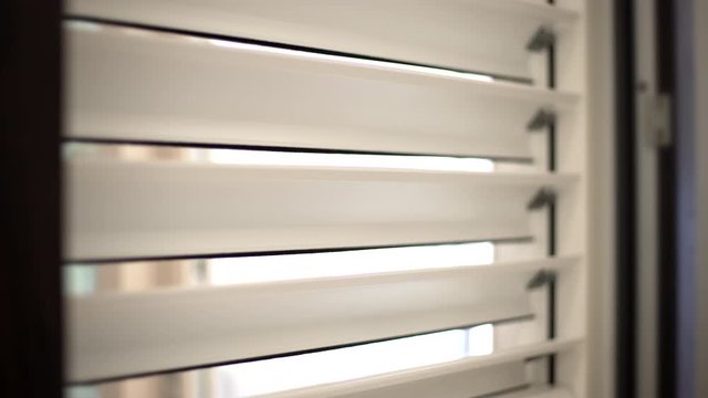 Shutting the blinds in a modern design house. Automated technological system. Copy space. 