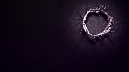 Lent Season,Holy Week and Good Friday concepts - photo of crown of thorns in purple vintage background