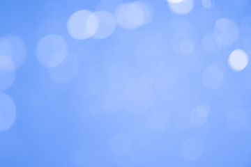 Blue glitter bokeh of light.Abstract blurred light