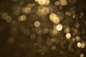 Golden glitter bokeh of light.Abstract blurred light