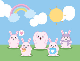 cute little rabbits with rainbow in the field kawaii characters
