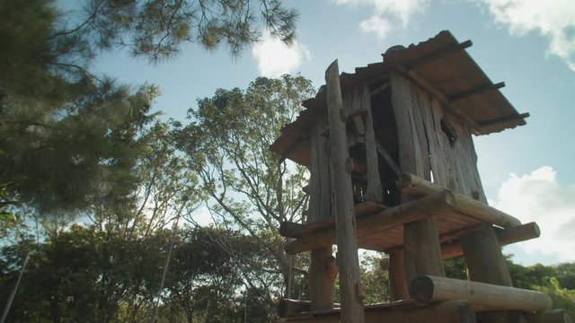 Rustic log cubby house in a forest with blue sky and clouds stock video Japan, 4K Resolution, Beauty In Nature, Clear Sky, Cloud - Sky