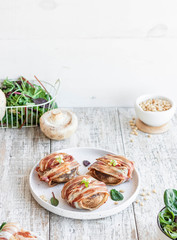 Baked mushrooms stuffed with cheese and pine nuts