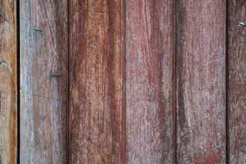 A texture of aged red wooden from old house