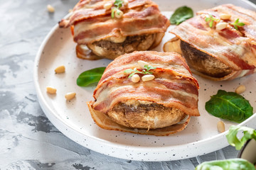 Baked mushrooms stuffed with cheese and pine nuts