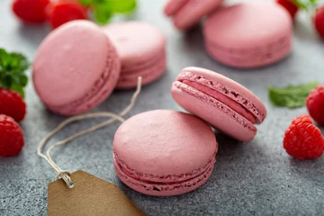 Washable wall murals Macarons Raspberry macarons on gray table with fresh raspberries and price tags