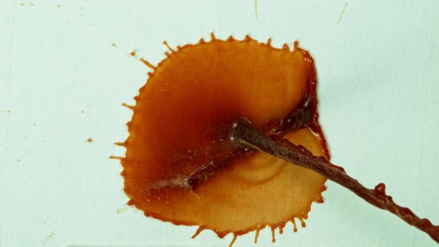 Slow motion shot of coffee spilling, shot with high speed cinematic camera at 1000 fps