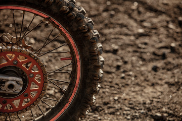 Close-up of the wheel of a racing cross-country motorcycle. Lifestyle.