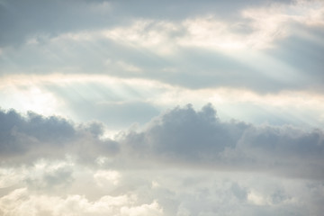 Fototapeta na wymiar heavenly cloudscape with shaft of light