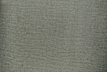 a photo of the pattern and texture of the gray wallpaper that adorns the walls