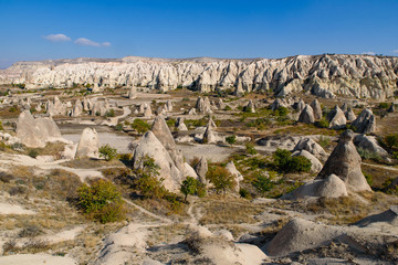 Rock formations of mountain ridges, valleys and pinnacles at Göreme National Park, Cappadocia,...