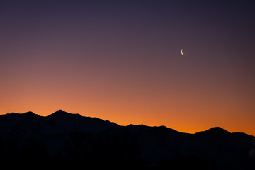 Beautiful morning sunrise over silhouette of Utah mountain range