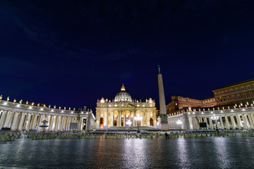 Fototapeta na wymiar Night view of St. Peter's Basilica in Vatican City, the largest church in the world