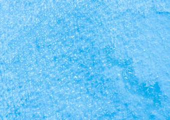 Fototapeta na wymiar blue texture of an snow surface with pure ice white wave , blue cold clear cryslallized wall background ,decorative plaster background close up , abstract macro wallpaper