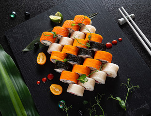 sushi on the black background