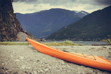 Kayak on fjord shore, Flam, Norway