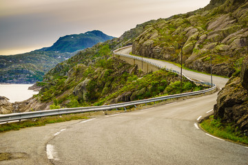 Obraz premium Road winding in mountains Norway