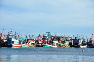 Fototapeta premium View of Thai fishing port on a clear bright day.