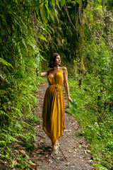 Fototapeta premium Positive delighted brunette woman enjoying exotic landscape