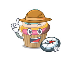 Rainbow cupcake experienced Explorer using a compass