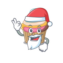Obraz premium Rainbow cupcake in Santa cartoon character style with ok finger