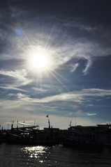 View of Thai fishing port on a clear bright day.