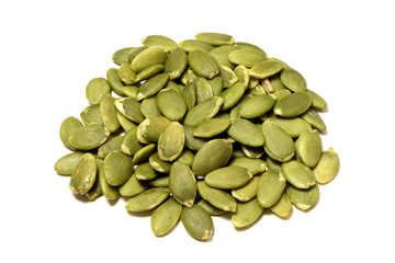 Pumpkin seeds isolated on white background.