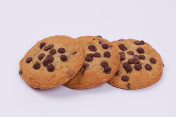 Top view of chocolate cookies isolated on a white background