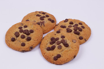Top view of chocolate cookies isolated on a white background