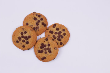 Top view of chocolate cookies isolated on a white background