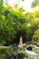 Smiling woman walking in jungles stock photo
